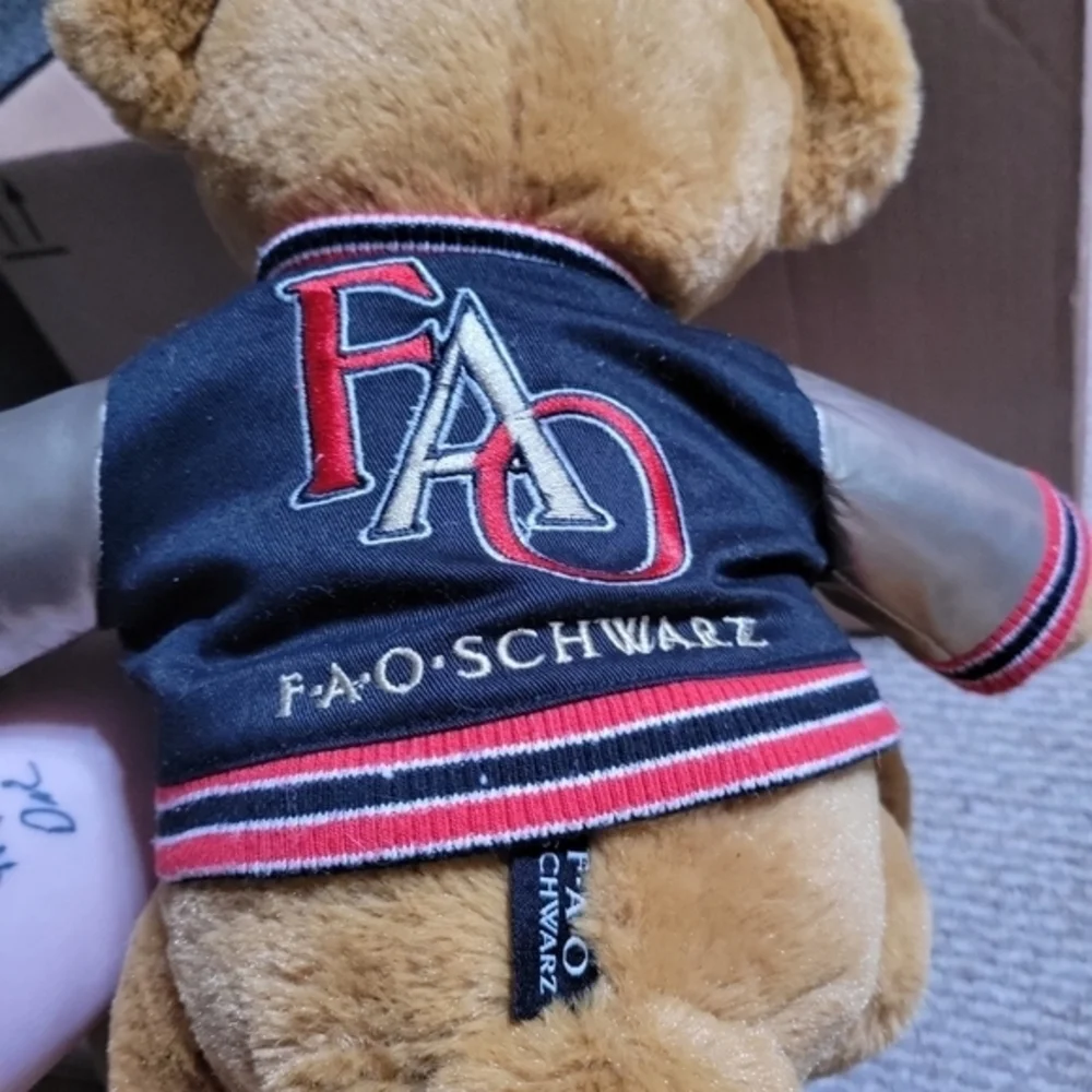 FAO Schwarz teddy bear Macy with varsity‎ jacket